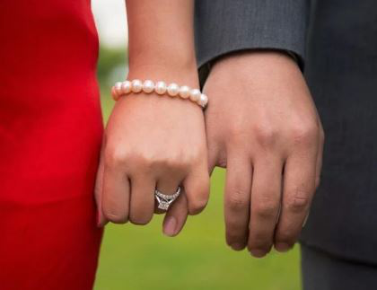 Woman showing off her engagement ring