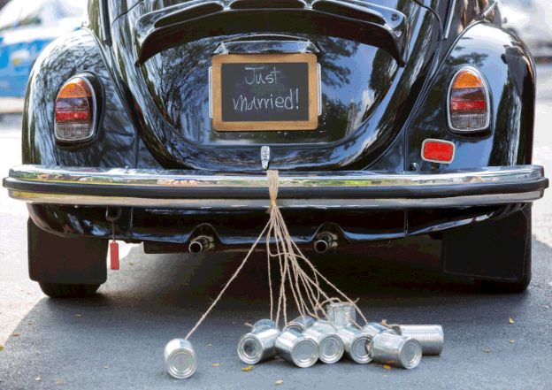 A car with a "Just Married" plate in New Haven, Connecticut, symbolizing the joyful start of a couple's married life.